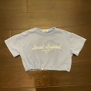 ADIKA CROPPED LIGHT BLUE SHIRT WITH DRAWSTRING